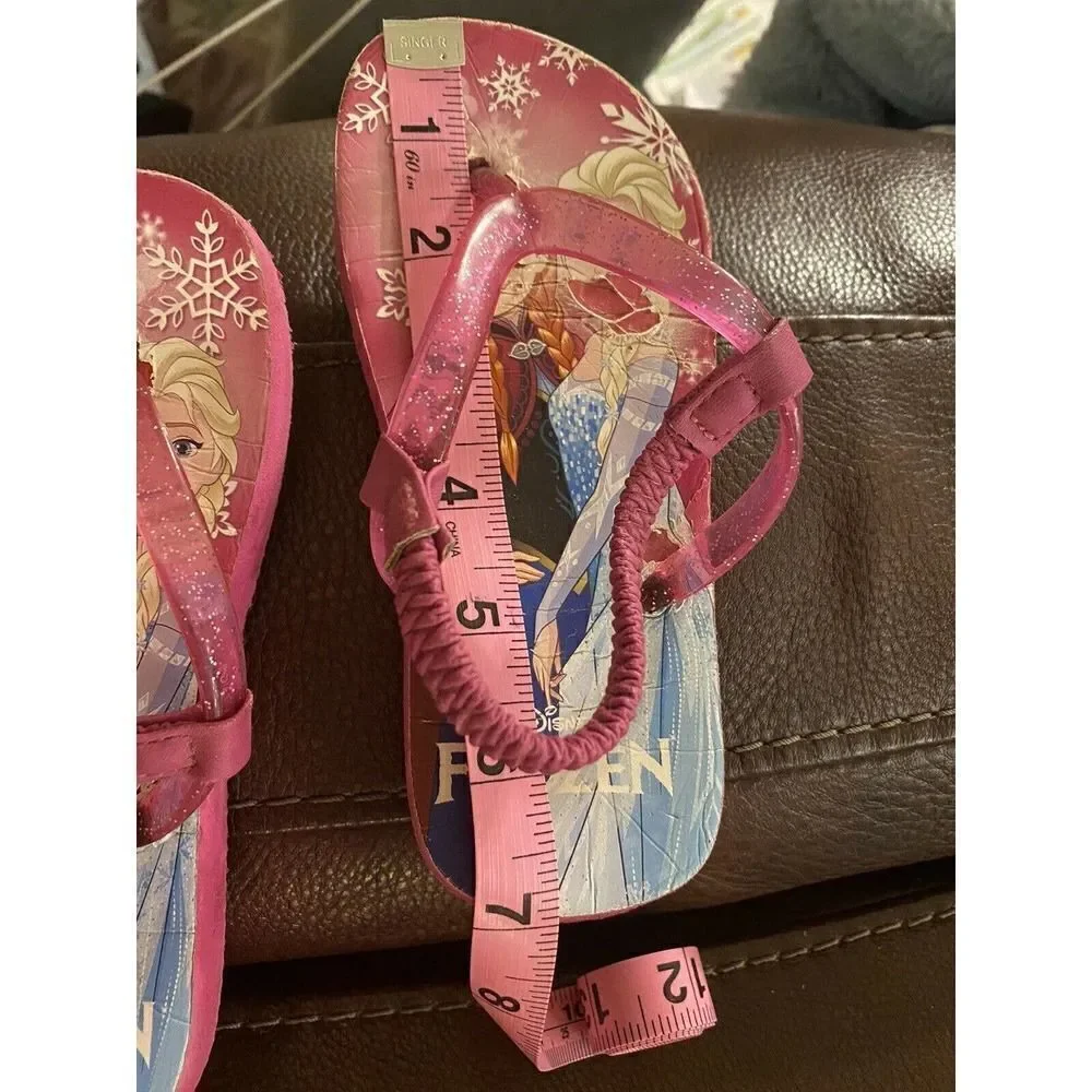 Frozen girls pink glittery flip flops